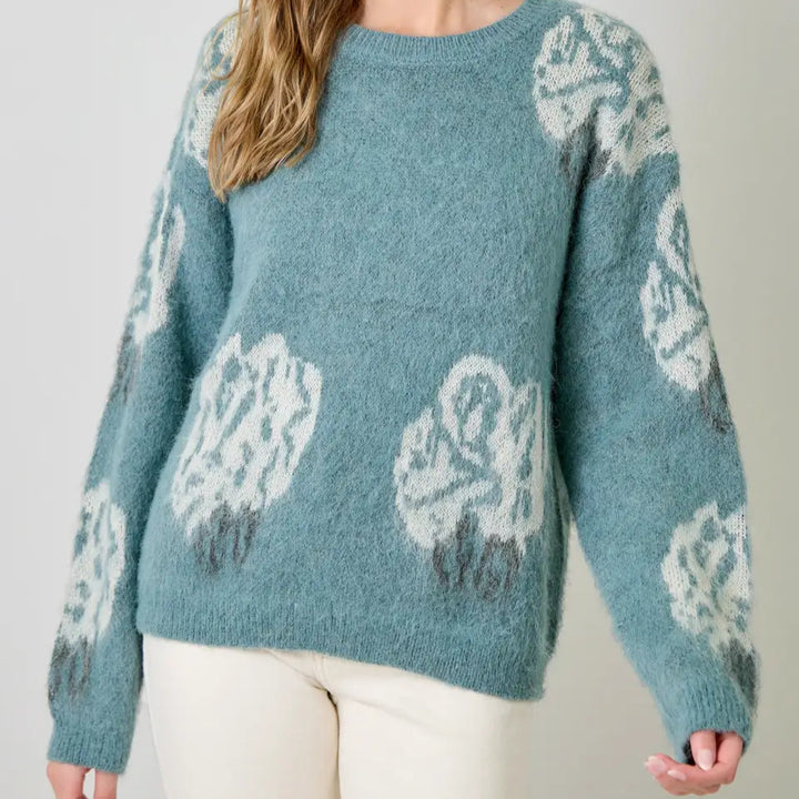 Women's loose-fit round neck top with ribbed knit lining – cozy and casual style.