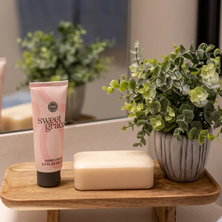 Sweet Grace Hand Cream – Nourishing shea butter and vitamin E lotion with exotic passion fruit, sparkling tea, and patchouli fragrance; top-selling oriental and spice skincare essential.
