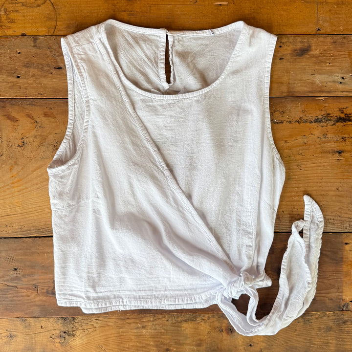"Women’s sleeveless top – features front tie detail, cinched back, and true-to-size fit for a flattering and feminine look."