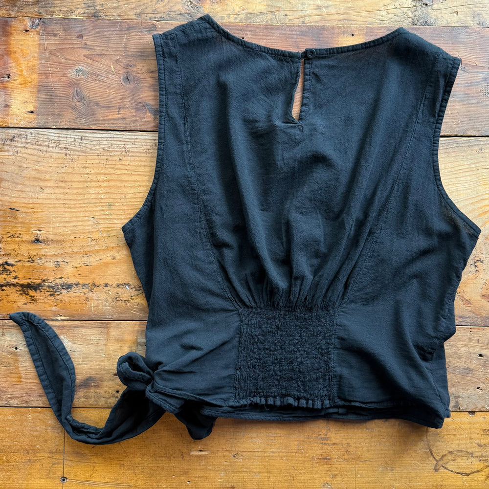 "Women’s sleeveless top – features front tie detail, cinched back, and true-to-size fit for a flattering and feminine look."