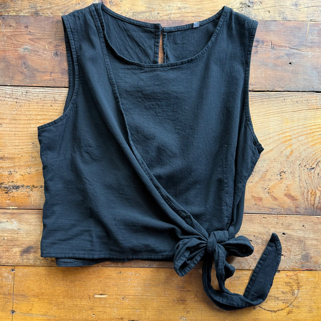 "Women’s sleeveless top – features front tie detail, cinched back, and true-to-size fit for a flattering and feminine look."