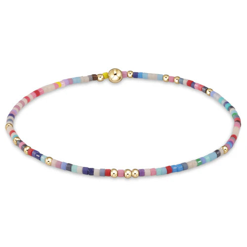 Colorful seed bead bracelet with 14kt gold-filled accents, 5.75" stretch fit & worry-free wear—fun, elegant gift for women 30+.