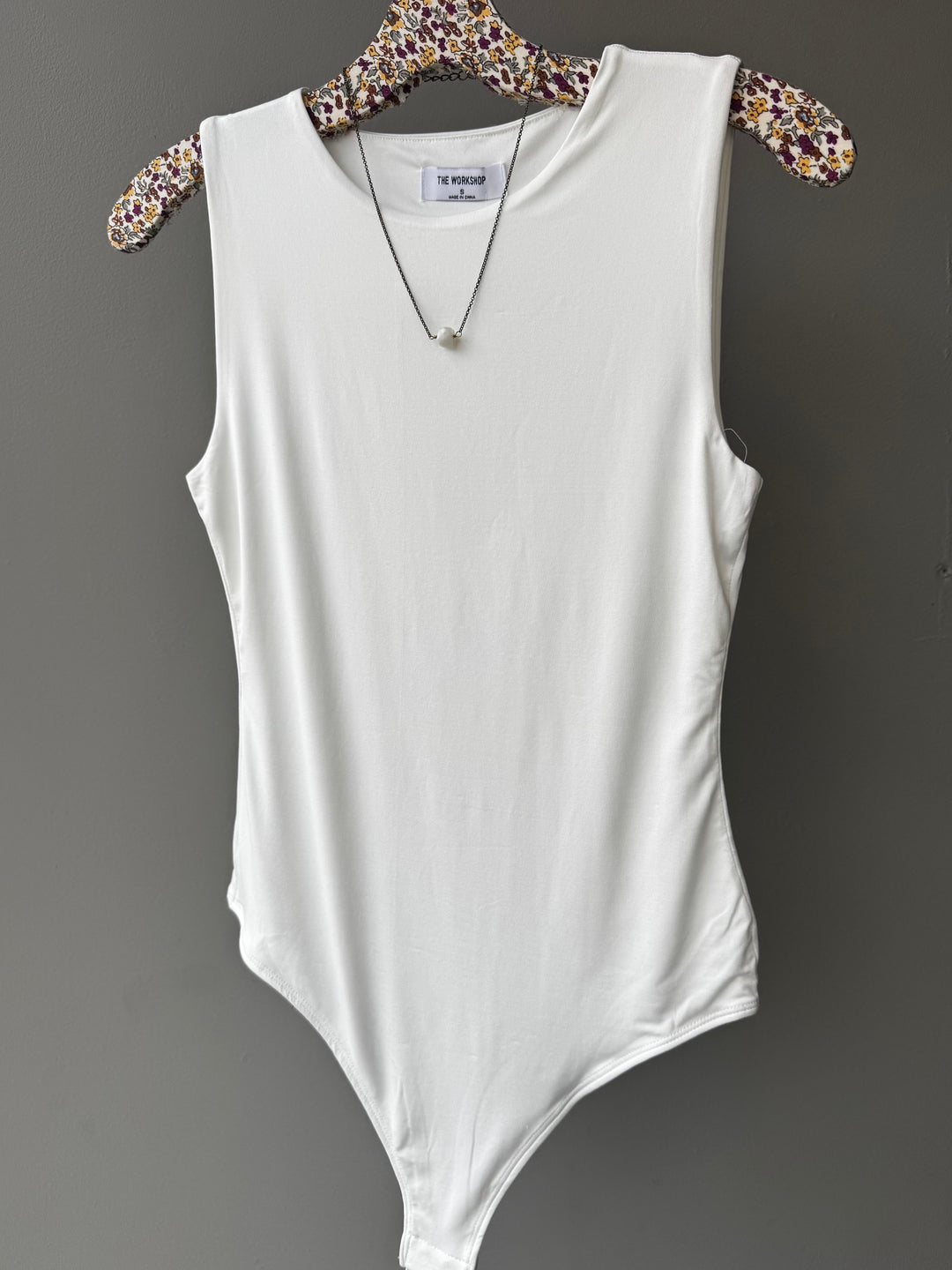 Soft, stretchy top with a flattering fit—perfect for layering and empowering stylish women 30+.