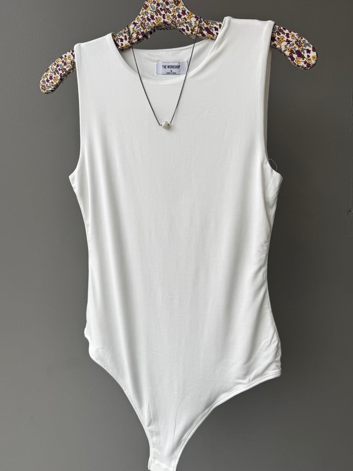 Soft, stretchy top with a flattering fit—perfect for layering and empowering stylish women 30+.