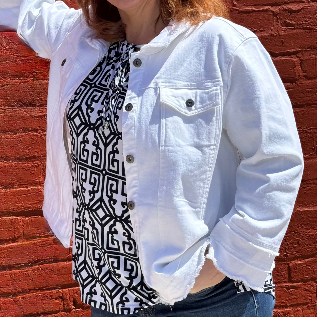 True-to-size top with 4-pocket design, button front, and triple fringe sleeves—bold, confident style for women 30+.