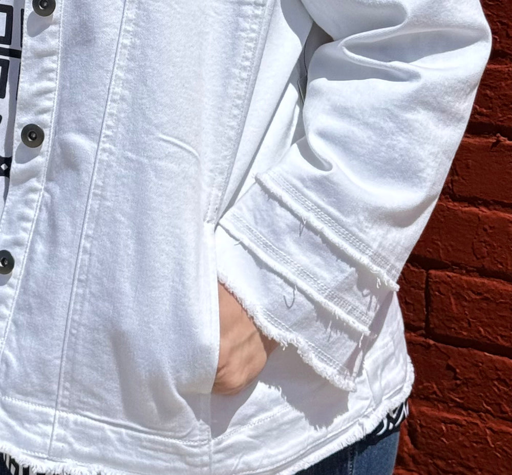 True-to-size top with 4-pocket design, button front, and triple fringe sleeves—bold, confident style for women 30+.