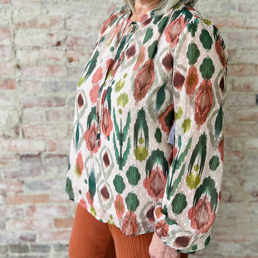 "Women's lightweight romantic top with relaxed fit – versatile for any occasion, available in plus sizes; runs slightly small in fit"