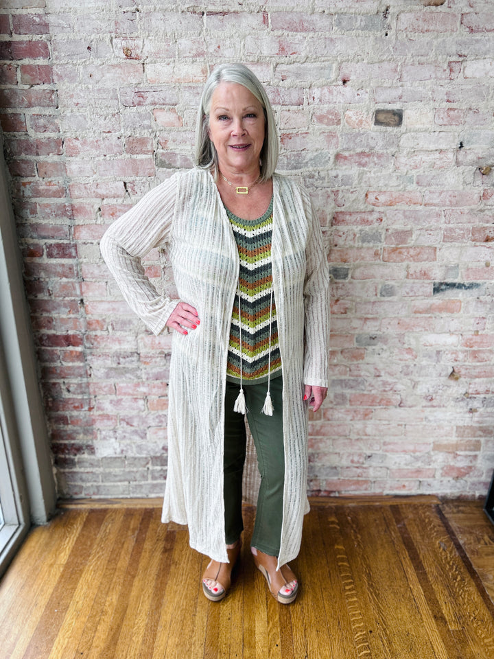 "Women's Needle Out lightweight maxi duster – long, flowy design adds effortless sophistication to any outfit, perfect for layering"