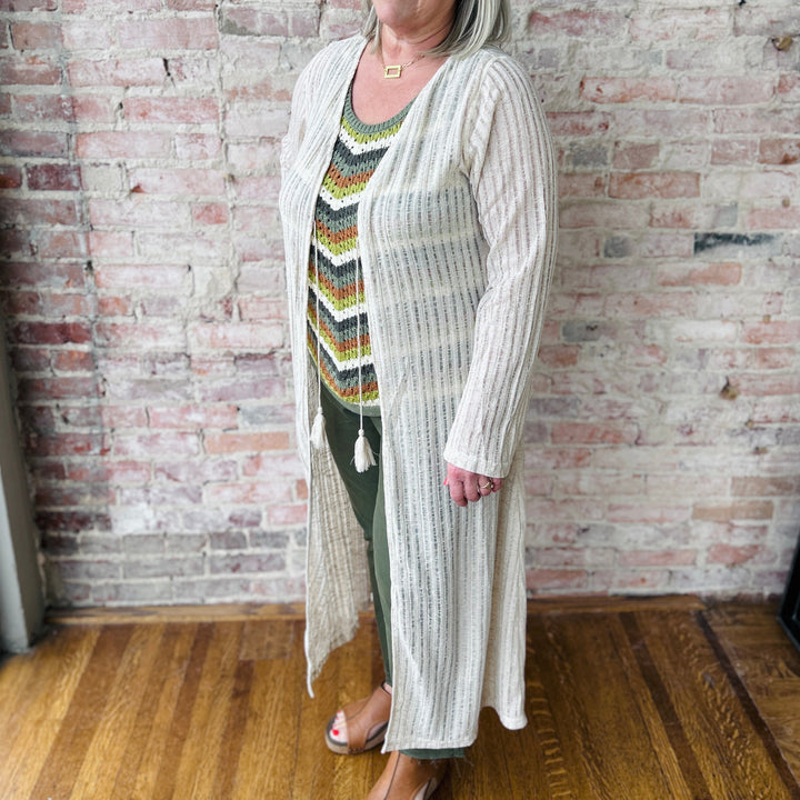 "Women's Needle Out lightweight maxi duster – long, flowy design adds effortless sophistication to any outfit, perfect for layering"