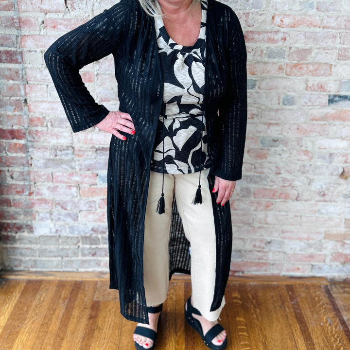 "Women's Needle Out lightweight maxi duster – long, flowy design adds effortless sophistication to any outfit, perfect for layering"