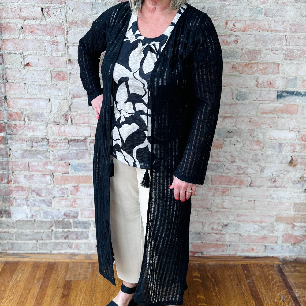 "Women's Needle Out lightweight maxi duster – long, flowy design adds effortless sophistication to any outfit, perfect for layering"