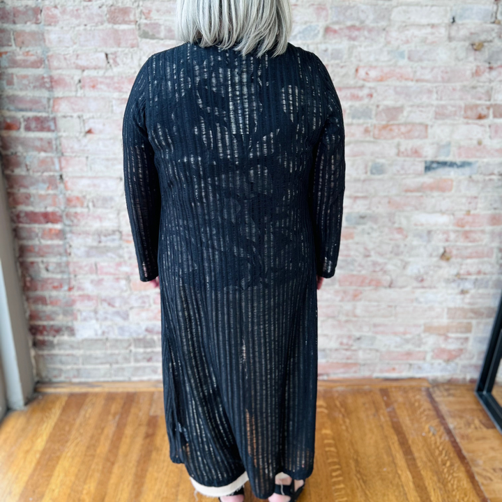 "Women's Needle Out lightweight maxi duster – long, flowy design adds effortless sophistication to any outfit, perfect for layering"