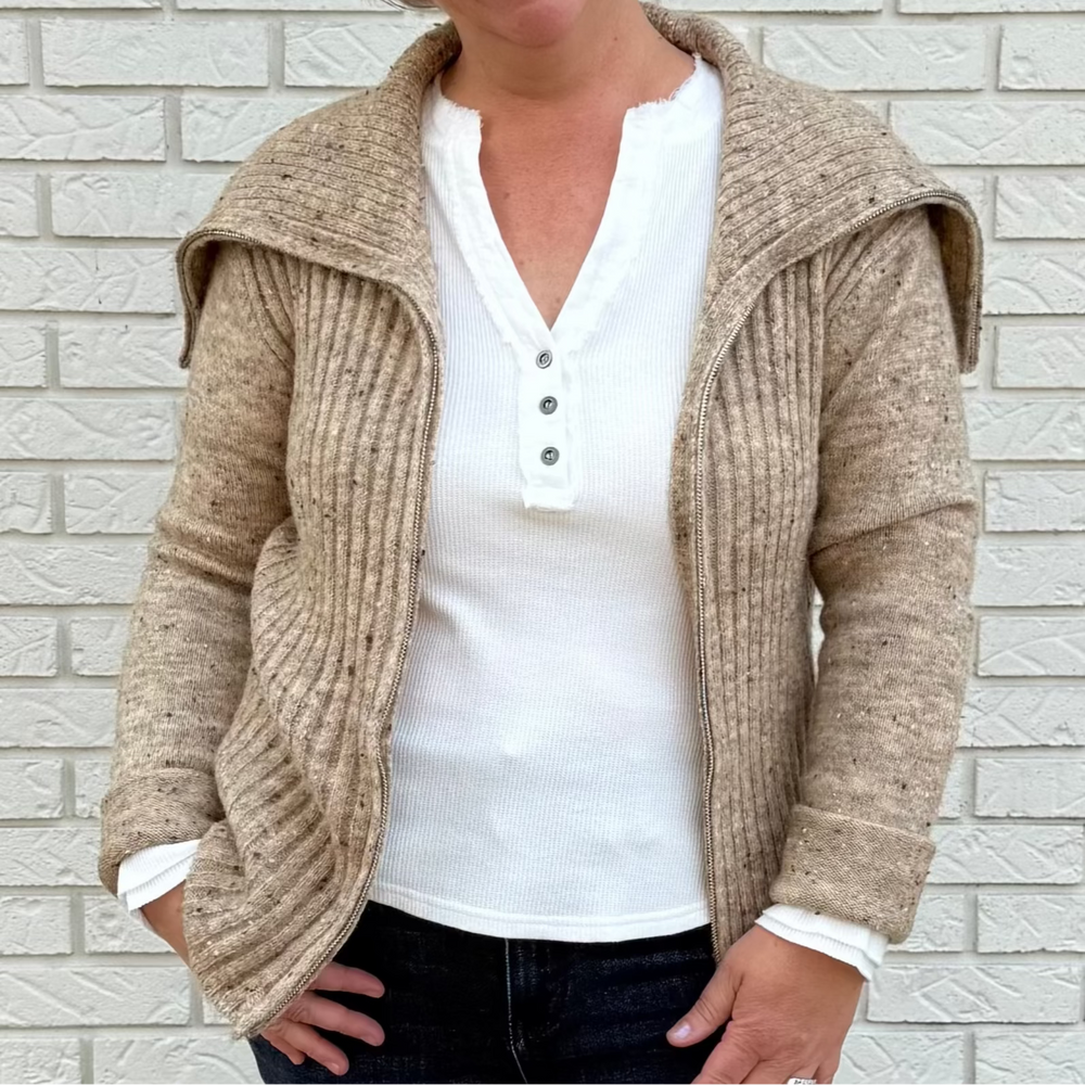 Women's long sleeve V-neck top with button trim and hi-lo hem – model Becky wears a medium, fits true to size.