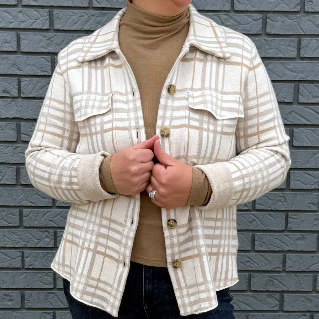 Women's button-down shirt with chest pockets and a hi-lo hem – model Becky wears a medium, fits true to size.
