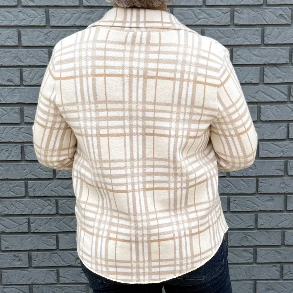 Women's button-down shirt with chest pockets and a hi-lo hem – model Becky wears a medium, fits true to size.