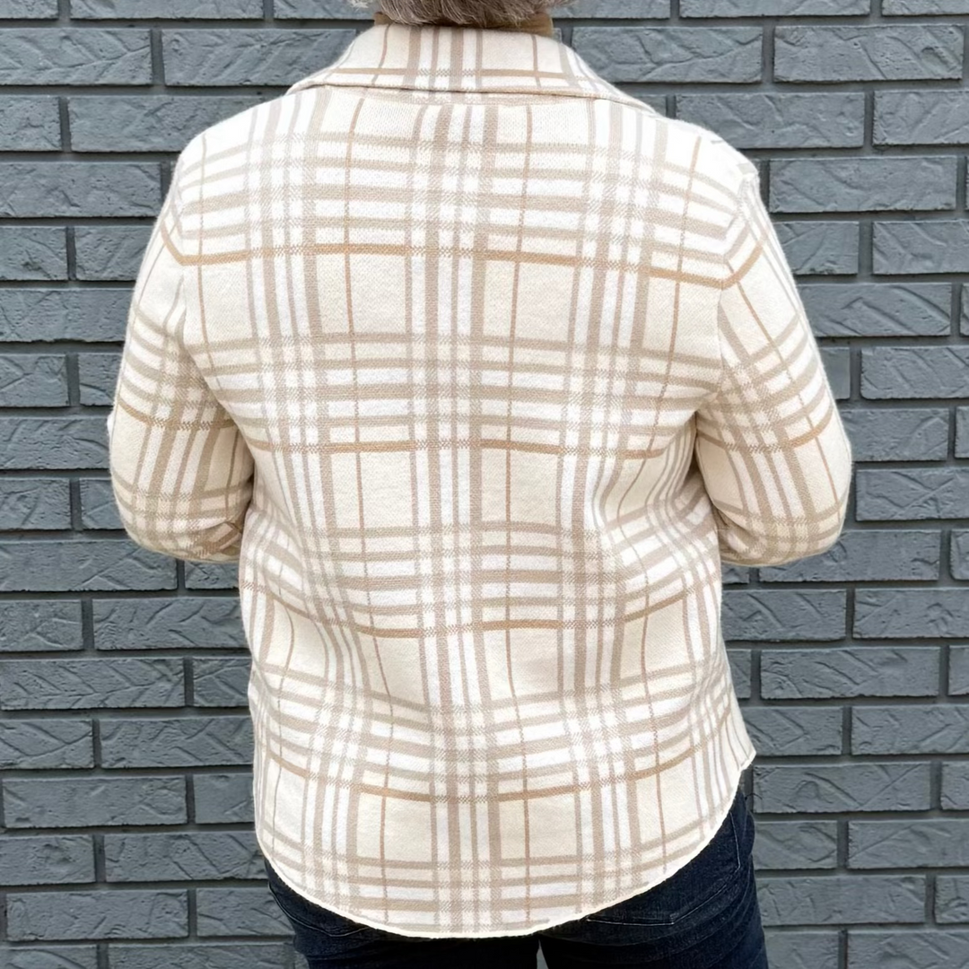 Women's button-down shirt with chest pockets and a hi-lo hem – model Becky wears a medium, fits true to size.