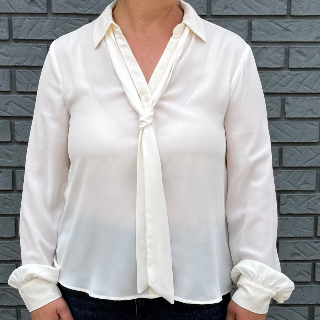Women's loose-fit button-down top with long bubble sleeves – model Becky wears a small, fits slightly oversized.