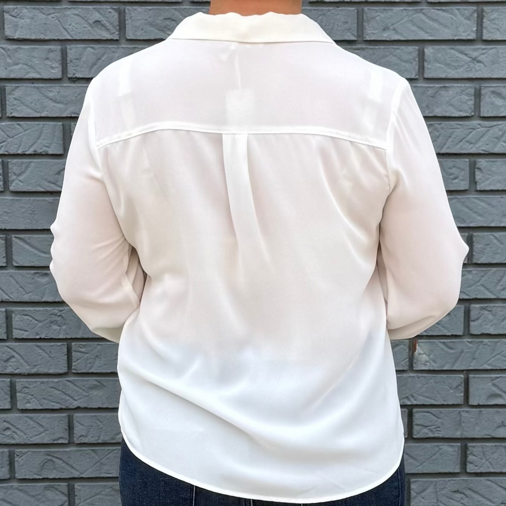 Women's loose-fit button-down top with long bubble sleeves – model Becky wears a small, fits slightly oversized.