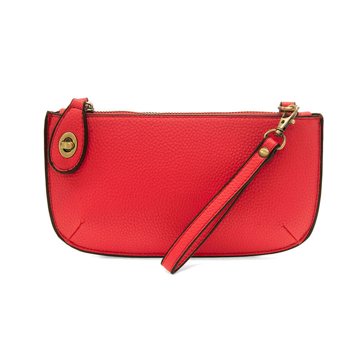 Chic convertible wristlet with zip and turn-lock closure, card slots, and straps—stylish, functional gift for confident women 30+.