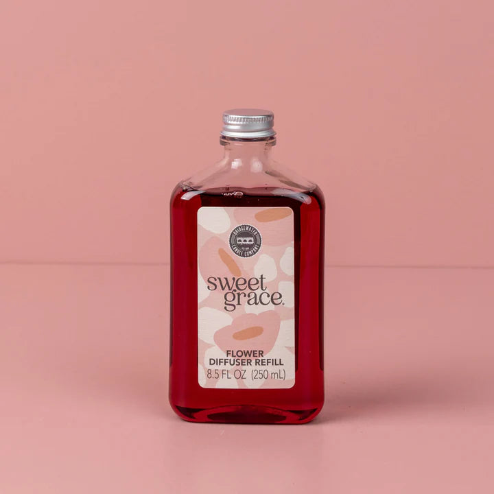 "Sweet Grace Flower Diffuser Refill 8.5 oz – extends life of diffuser with best-selling oriental & spice fragrance featuring passion fruit, sparkling tea, and patchouli; lasts up to 60 days."