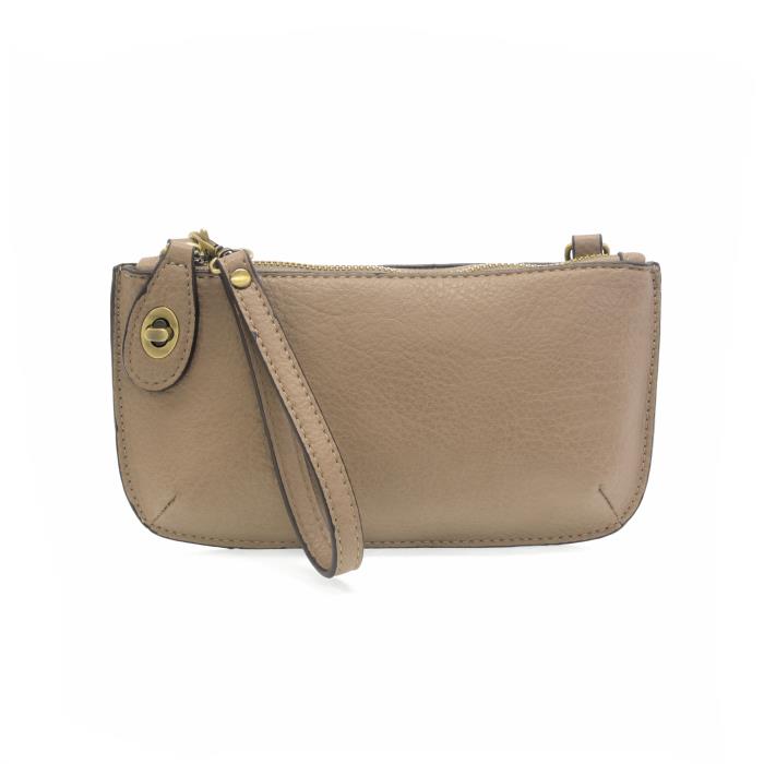 Chic convertible wristlet with zip and turn-lock closure, card slots, and straps—stylish, functional gift for confident women 30+.