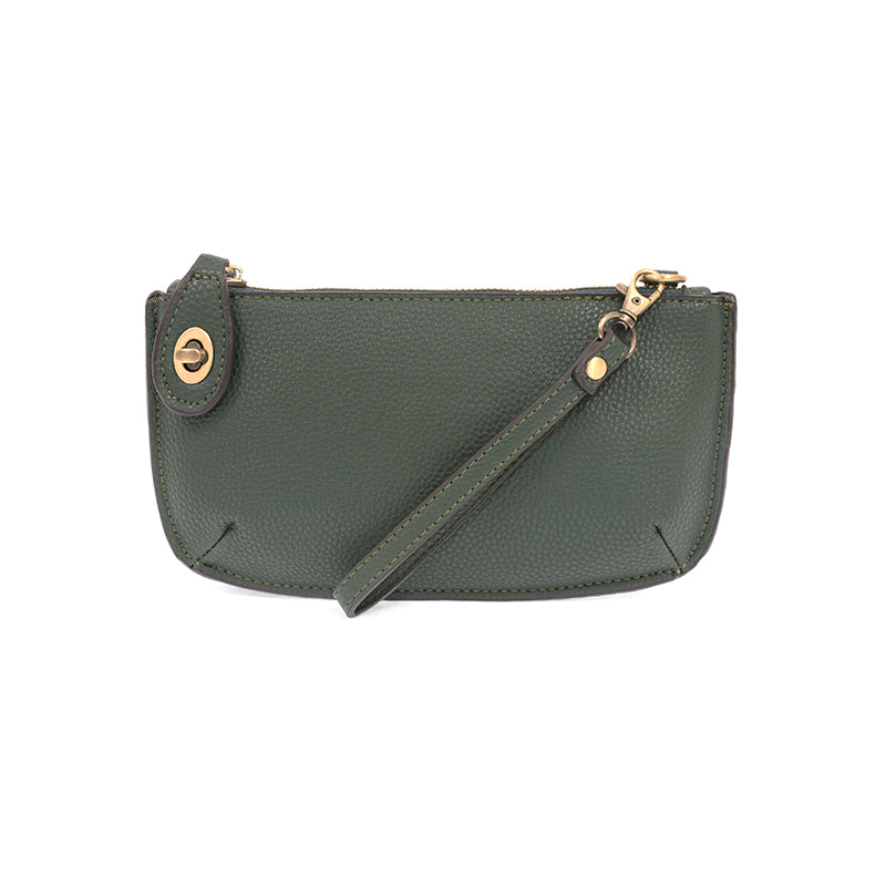 Chic convertible wristlet with zip and turn-lock closure, card slots, and straps—stylish, functional gift for confident women 30+.
