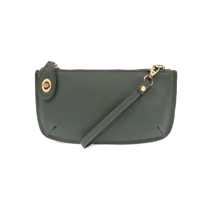 Chic convertible wristlet with zip and turn-lock closure, card slots, and straps—stylish, functional gift for confident women 30+.