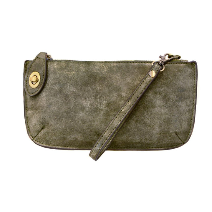 Chic convertible wristlet with zip and turn-lock closure, card slots, and straps—stylish, functional gift for confident women 30+.