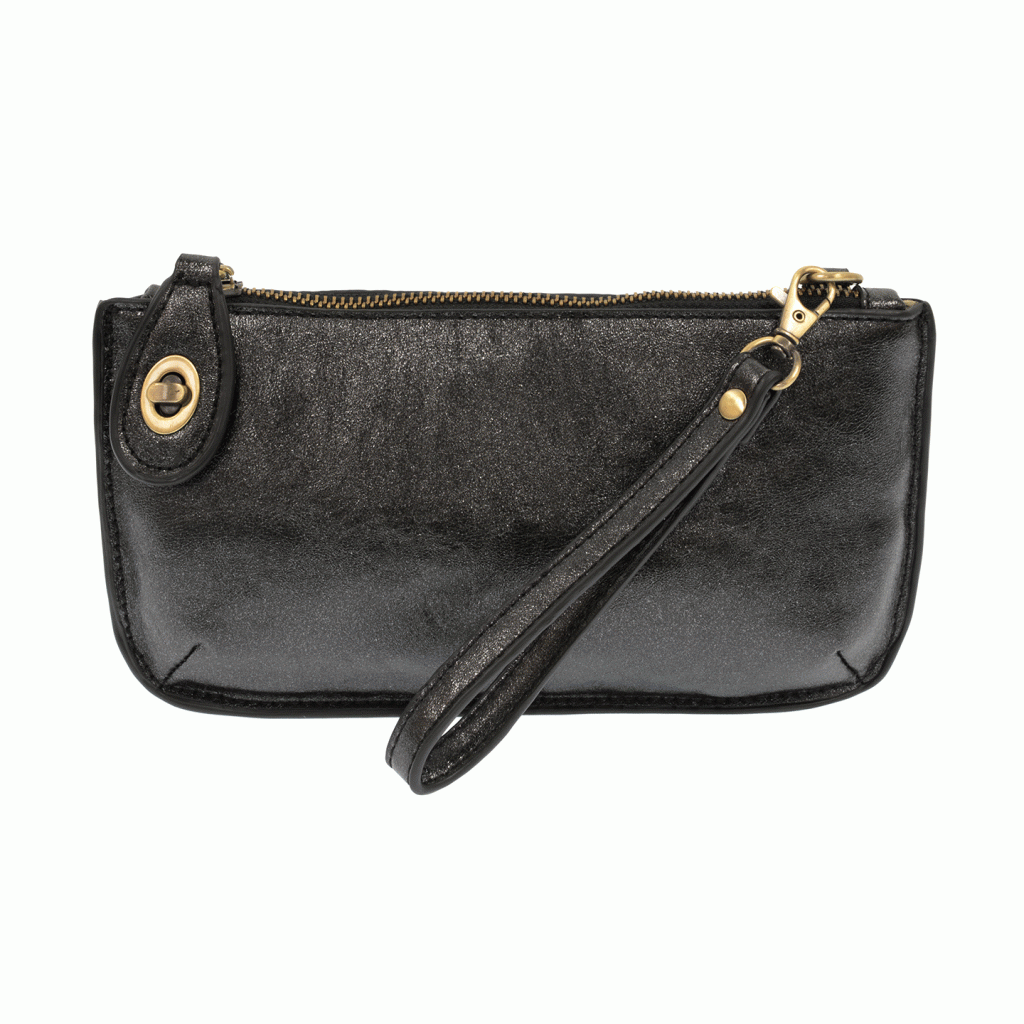 Chic convertible wristlet with zip and turn-lock closure, card slots, and straps—stylish, functional gift for confident women 30+.