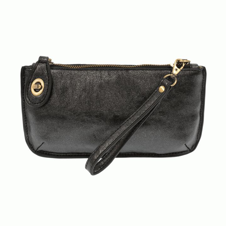 Chic convertible wristlet with zip and turn-lock closure, card slots, and straps—stylish, functional gift for confident women 30+.