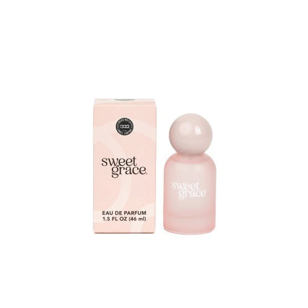 "Sweet Grace perfume – frosted pink bottle with glossy pink ball top, featuring iconic warm and pure fragrance with passion fruit, sparkling tea, and patchouli."