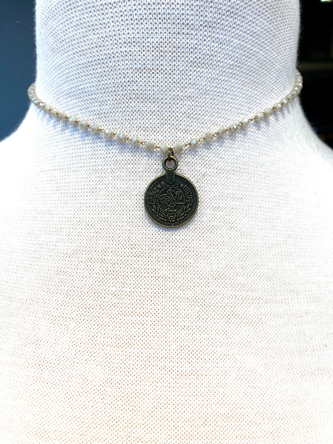Delicate Taurus necklace with a simple gold-tone design—elegant zodiac jewelry for confident, stylish women 30+.