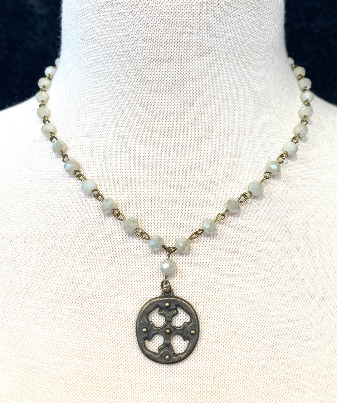 Celtic-inspired necklace with intricate knot design—timeless, meaningful accessory for stylish, confident women 30+.