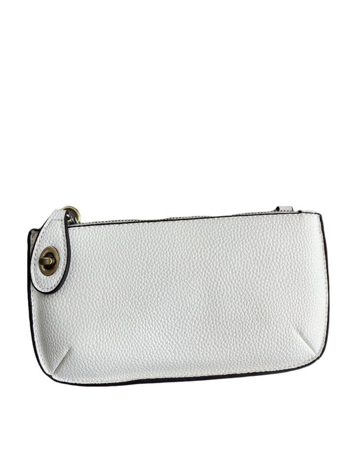 Chic 9.5in vegan leather wristlet with turn lock top zip closure card slots and adjustable strap perfect for stylish women 30+ on the go