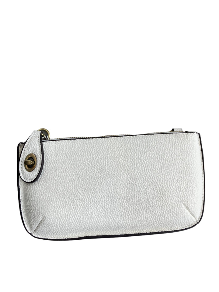 Chic 9.5in vegan leather wristlet with turn lock top zip closure card slots and adjustable strap perfect for stylish women 30+ on the go