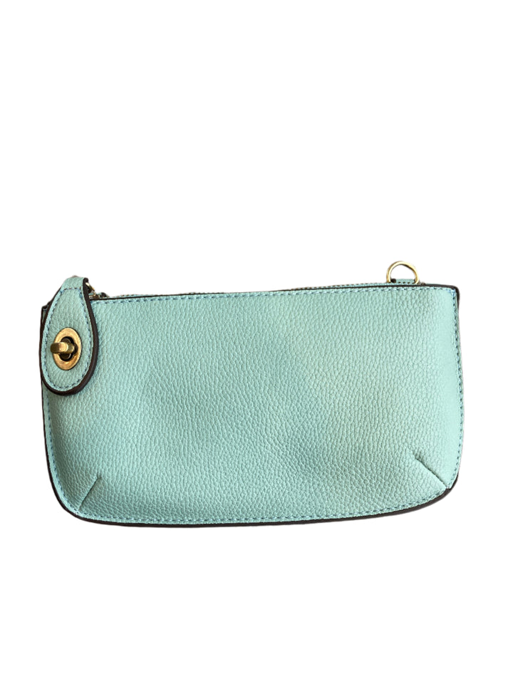 Chic 9.5in vegan leather wristlet with turn lock top zip closure card slots and adjustable strap perfect for stylish women 30+ on the go