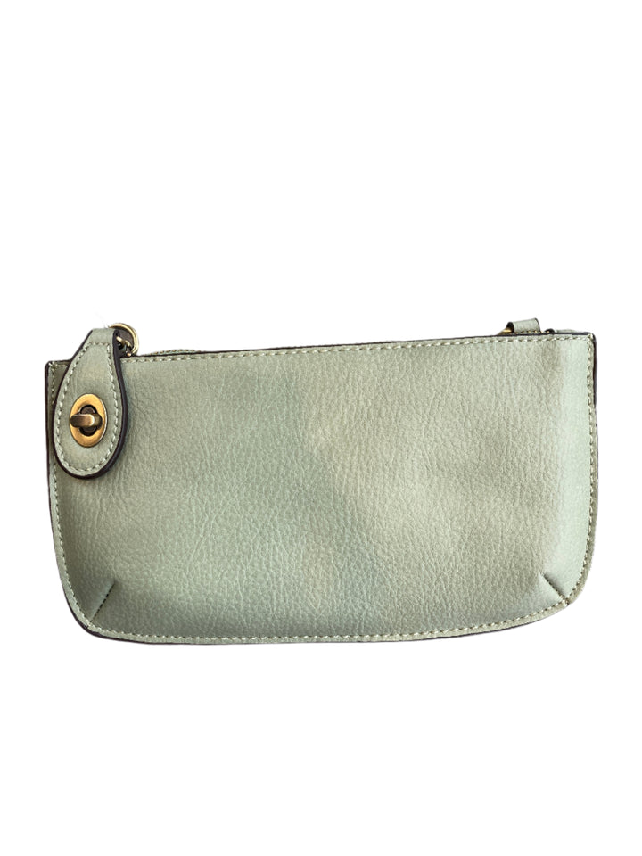 Chic 9.5in vegan leather wristlet with turn lock top zip closure card slots and adjustable strap perfect for stylish women 30+ on the go