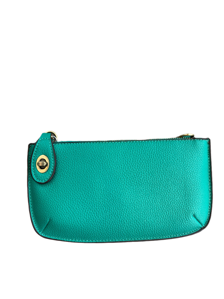 Chic 9.5in vegan leather wristlet with turn lock top zip closure card slots and adjustable strap perfect for stylish women 30+ on the go