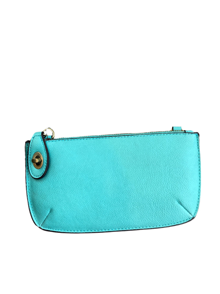 Chic 9.5in vegan leather wristlet with turn lock top zip closure card slots and adjustable strap perfect for stylish women 30+ on the go