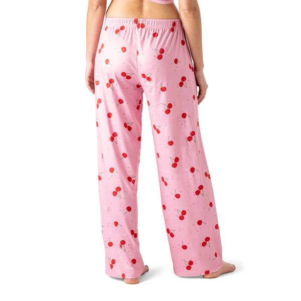Pink pajama pants with red cherry print pattern, elastic waistband, relaxed fit