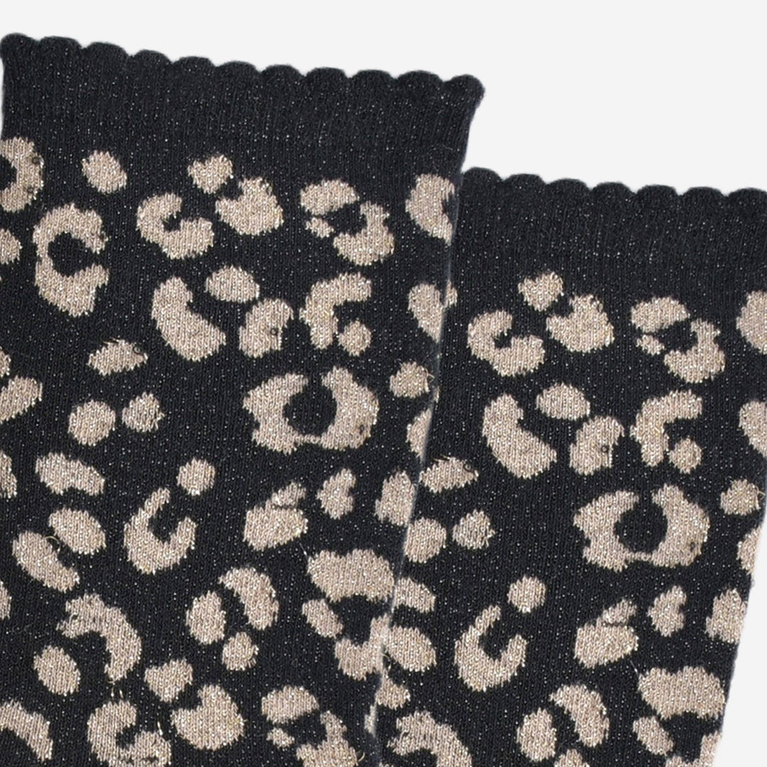 Black knitted socks with gold glitter leopard print pattern and scalloped cuff edge
