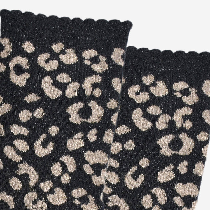 Black knitted socks with gold glitter leopard print pattern and scalloped cuff edge