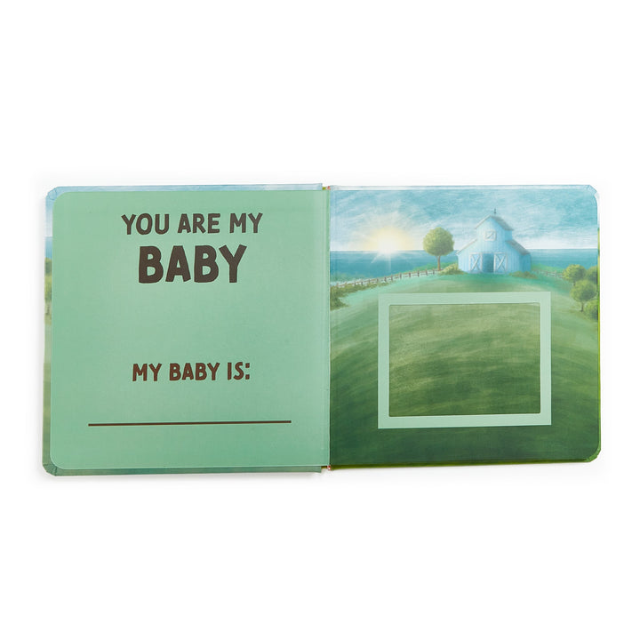 Bunnies by the Bay 'You Are My Baby' board book open showing interior pages with farm illustration