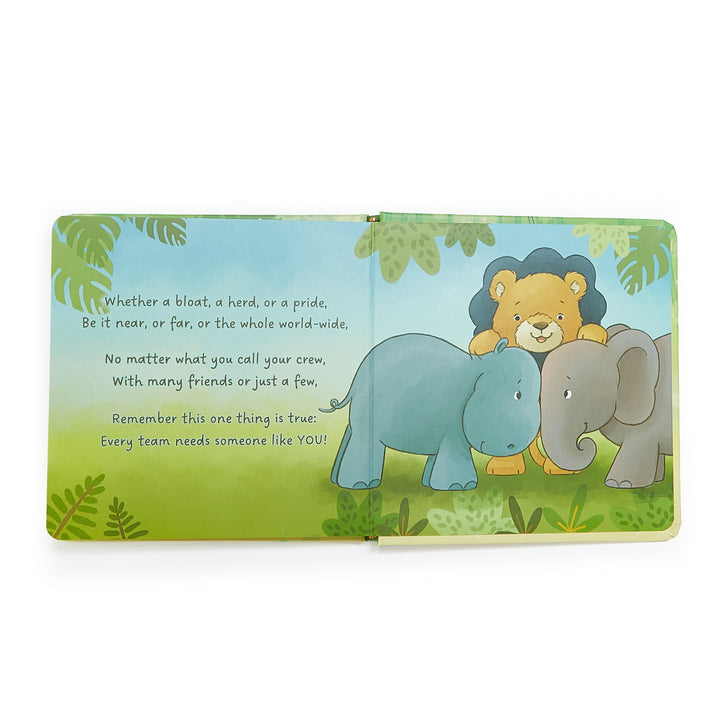 Open Critter Crews board book showing jungle animals and friendship poem inside spread.
