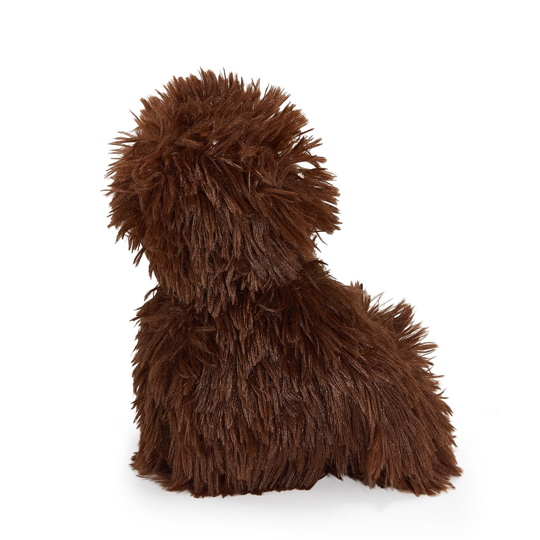 Back view of Sully the Sasquatch plush toy with shaggy dark brown fur.