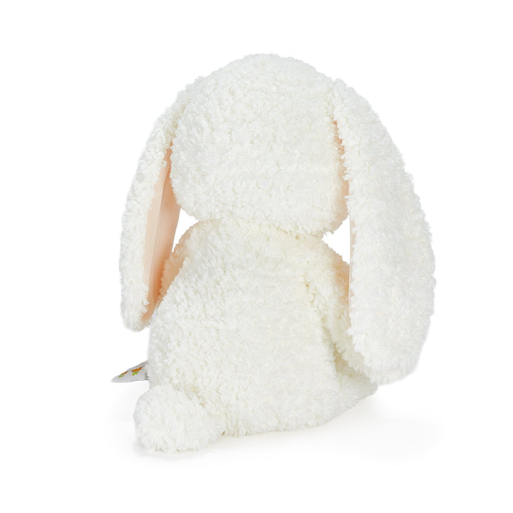 Back view of Snowball the Bunny plush toy with long floppy ears in cream white