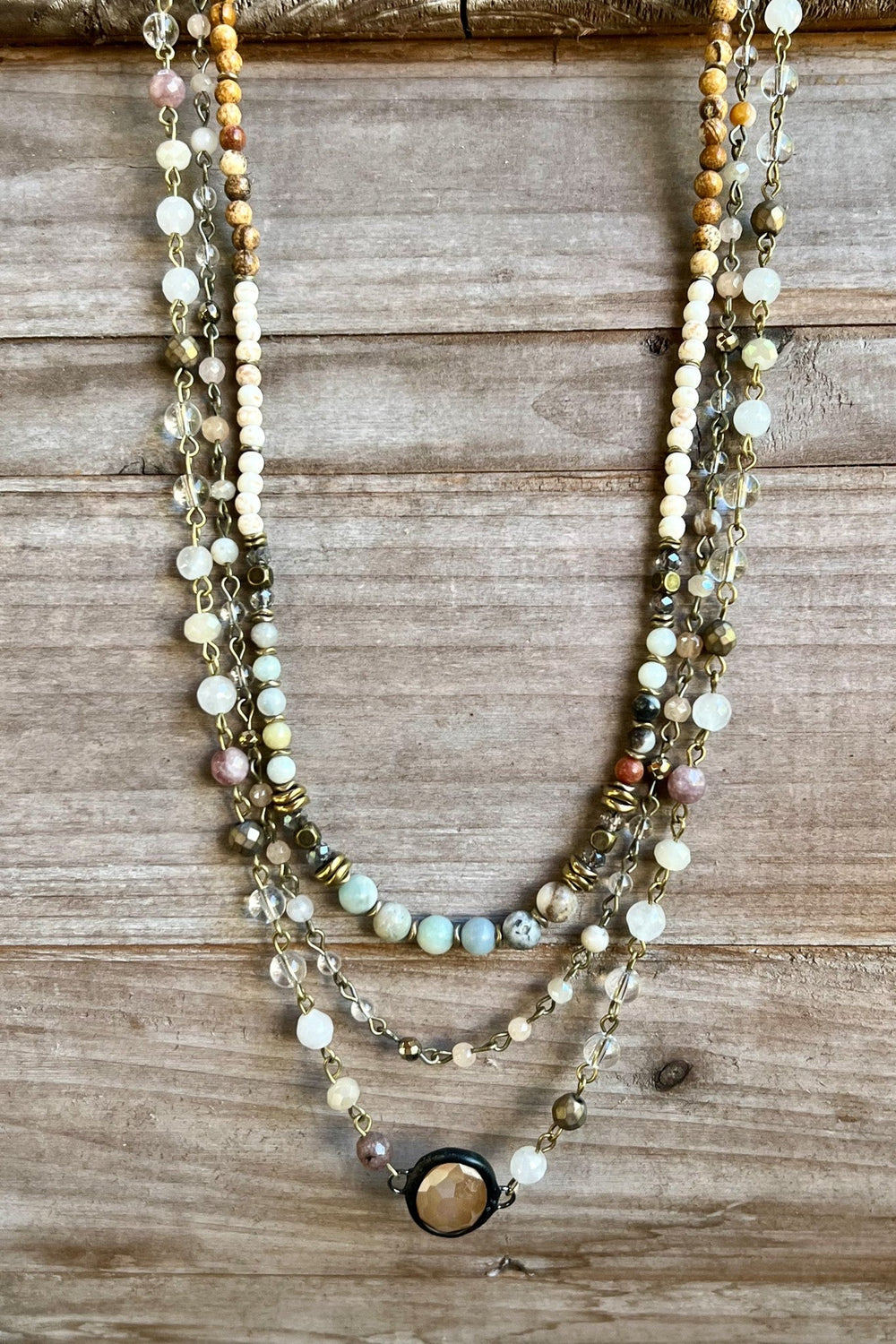 Dylan Jewelry Justina multi-strand beaded necklace with mixed neutral gemstones and gold chain
