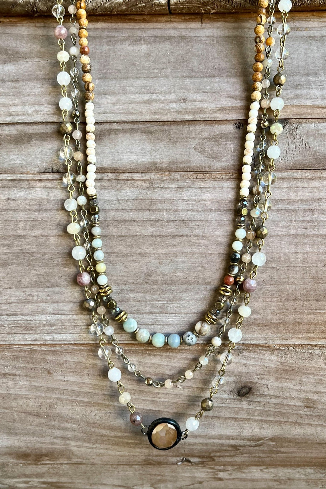 Dylan Jewelry Justina multi-strand beaded necklace with mixed neutral gemstones and gold chain