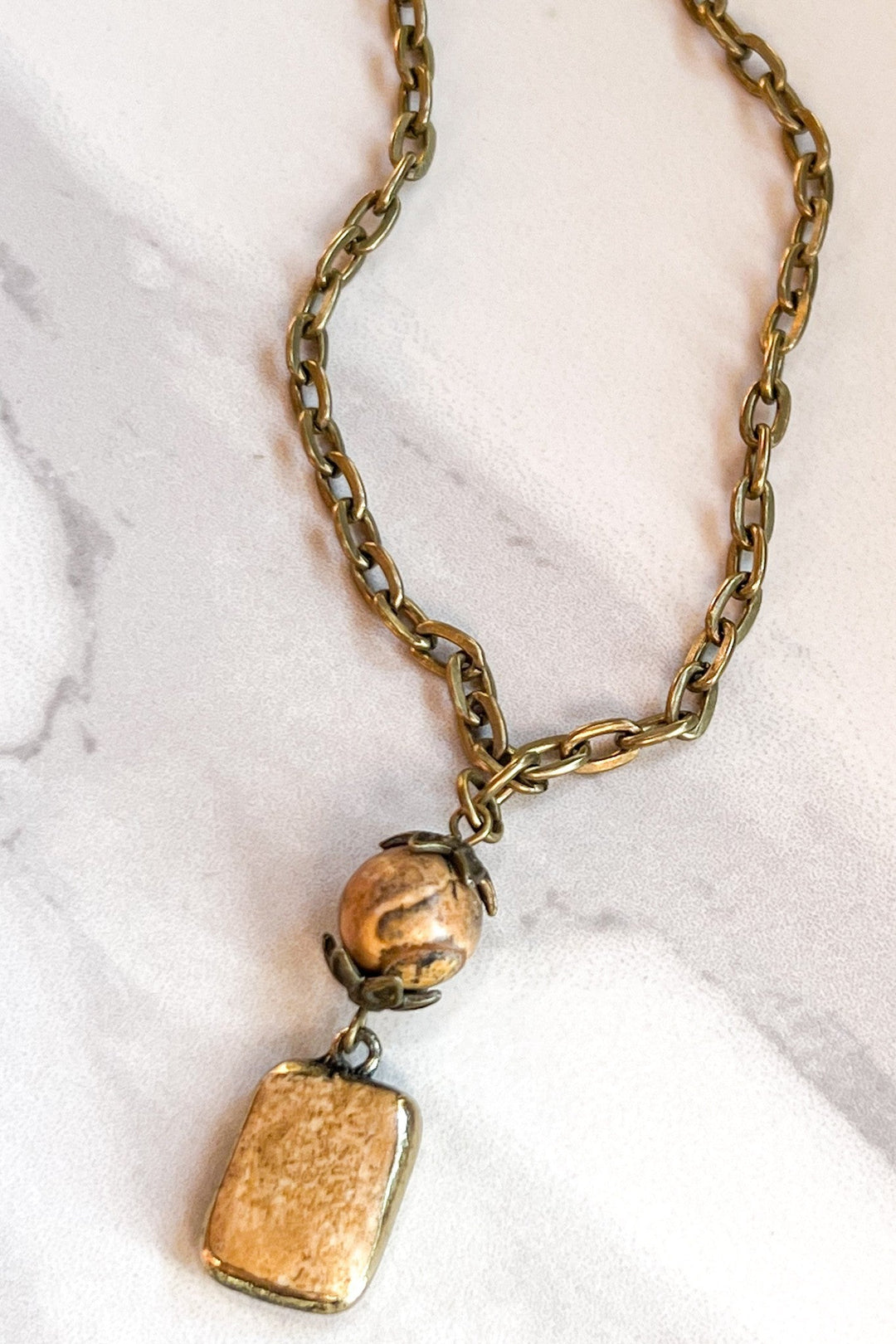 Dylan Jewelry Short Sicily Necklace with brass chain, stone bead, and rectangular pendant
