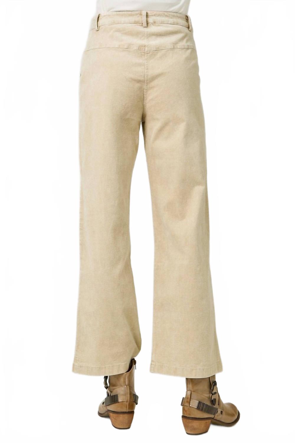 Mystree washed corduroy wide-leg trousers in almond color with model wearing sandals